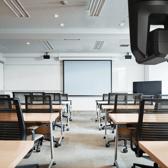 Atiroh PTZ camera setup in a smart classroom for online teaching and hybrid learning sessions.