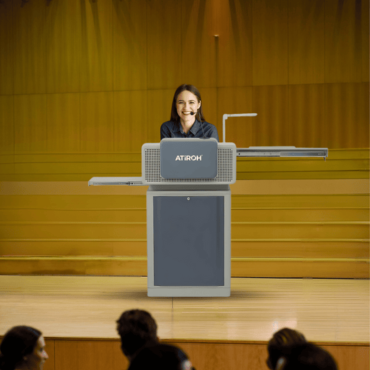 Atiroh digital podium used in an auditorium for smart lectures and professional presentations.